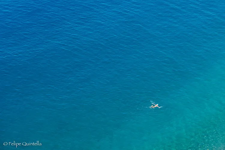 A man swimming in the sea in Nice