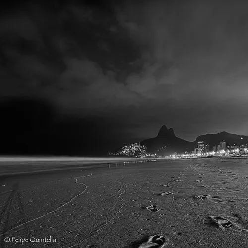 The Ipanema beach and the `Two Brothers' hills during the night