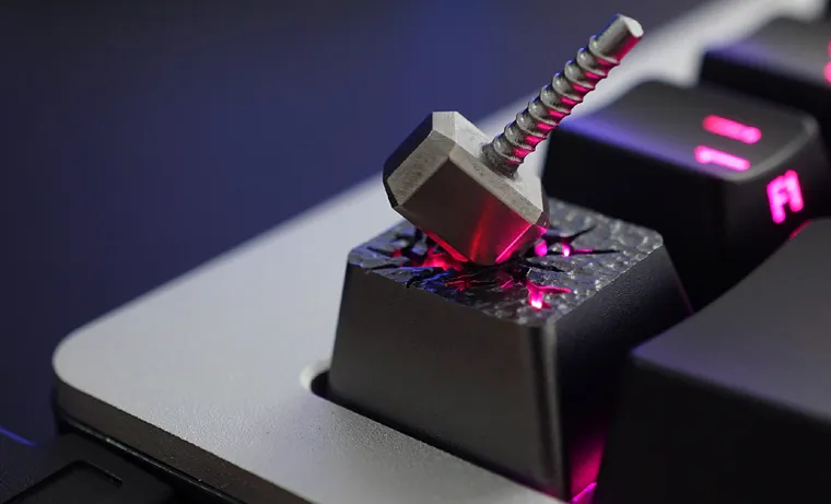 Crazy escape keycap showing a Thor Mjollnir hammer on top of it